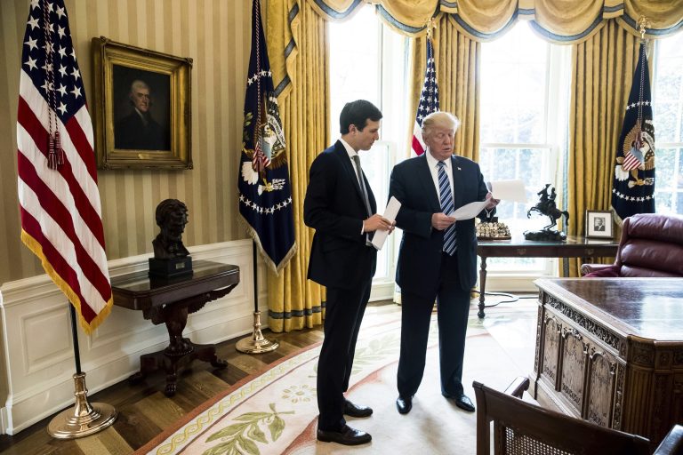 President Donald Trump speaks to White House Senior Adviser Jared Kushner, left, in the Oval Office. (AP Photo/Andrew Harnik)