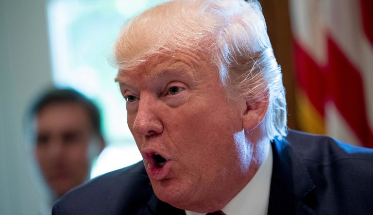 The president took to his Twitter account Friday morning to criticize the Russia investigation and appeared to attack Rosenstein. (AP Photo/Andrew Harnik)