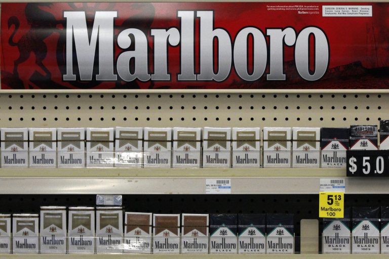 FILE - In this Wednesday, July 17, 2013 file photo, Marlboro cigarettes are on display in a CVS store in Pittsburgh. Major retailers will be paying close attention to the sales numbers after CVS Caremark pulls tobacco from its shelves by October. If the old retail rules governing tobacco have not changed outright, they are at least coming up for review. (AP Photo/Gene J. Puskar, File)