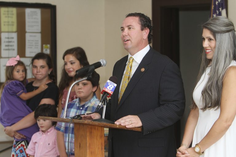 Fifth District U.S. Rep. Vance McAllister stands with his wife and children and announces his decision to run for re-election during a press conference at the American Legion Hall in Forsythe Park in Monroe, La., on Monday, June 30, 2014. (AP Photo/The News-Star, Emerald Mcintyre)