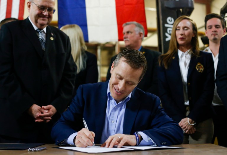 Missouri Gov. Eric Greitens signs legislation to make Missouri the 28th right-to-work state. Kentucky and Missouri have both implemented right-to-work laws in 2017. (Nathan Papes/The Springfield News-Leader via AP)