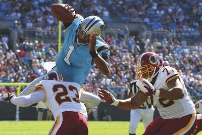 Dilip Vishwanat/Getty Images
Cam Newton threw for 256 yards and a touchdown and ran for 59 and another score as the Panthers handed the Redskins their second consecutive loss Sunday.