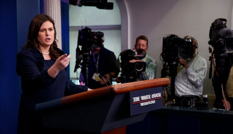 White House press secretary Sarah Sanders said neither the government shutdown nor the controversial campaign ad meant President Trump's relationship with Democrats had fully soured. (AP Photo/Evan Vucci)