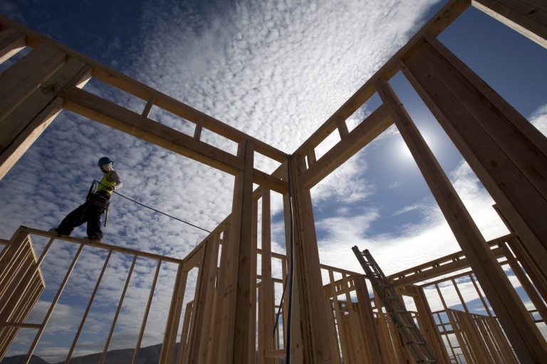   In this Friday, Nov. 16, 2012, photo, construction worker Elabert Salazar works on a house frame for a new home in Chula Vista, Calif. U.S. builders broke ground on fewer homes in November after starting work in October at the fastest pace in four years. Superstorm Sandy likely slowed starts in the Northeast. The Commerce Department said Wednesday, Dec. 19, 2012, that builders began construction of houses and apartments at a seasonally adjusted annual rate of 861,000. That was 3 percent less than October's annual rate of 888,000, the fastest since July 2008. (AP Photo/Gregory Bull)  