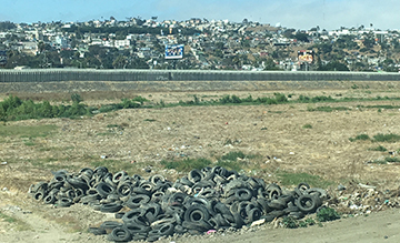 A tire mountain culled from waste entering the United States from Mexico.