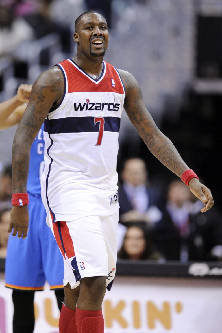 FILE - In this Jan. 18, 2012, file photo, Washington Wizards forward Andray Blatche (7) walks the court during the first half of an NBA basketball game against the Oklahoma City Thunder in Washington. The Wizards waived Blatche on Tuesday, July 17, designating him as the team's amnesty player. (AP Photo/Nick Wass, File)