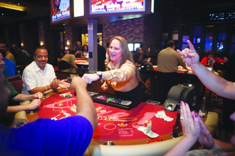 Graeme Jennings/Examiner
Gamblers celebrate when live table games opened at midnight, at the Maryland Live! Casino in Hanover on April 11.