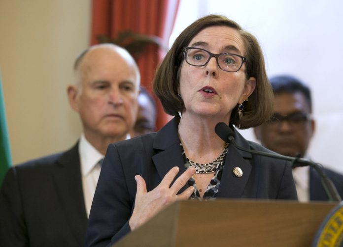 Oregon Gov. Kate Brown tweeted "yes! yes! yes" in support of a bill. Pro-life voters have no home in the Democratic Party. (AP Photo/Rich Pedroncelli)
