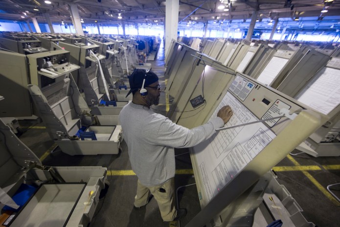 Hacker altered voter information on at least one occasion in a county database. (AP Photo/Matt Rourke)