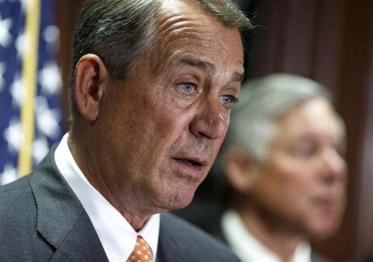 House Speaker John Boehner of Ohio, left, speaks during a news conference on Capitol Hill in Washington, Tuesday, Sept. 9, 2014. Boehner said Tuesday that Islamic State militants pose a serious threat that must be dealt with in Iraq, Syria or wherever they exist as he pressed President Barack Obama to spell out the U.S. strategy to destroy the militants. (AP Photo/J. Scott Applewhite)