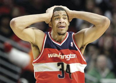 Nam Y. Huh/AP
Wizards center JaVale McGee was benched after throwing himself an alley-oop in a loss to the Rockets earlier this season.