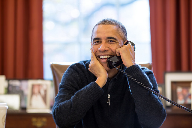 President Barack Obama makesThanksgiving Day phone calls to U.S. troops, from the Oval Office, Nov. 27, 2014.
(Official White House Photo by Pete Souza)