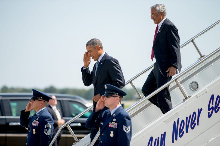 President Obama, accompanied by Rep. Bobby Scott, D-Va., right, arrives at Des Moines International Airport, Monday, Sept. 14, 2015, in Des Moines. (AP Photo/Andrew Harnik)