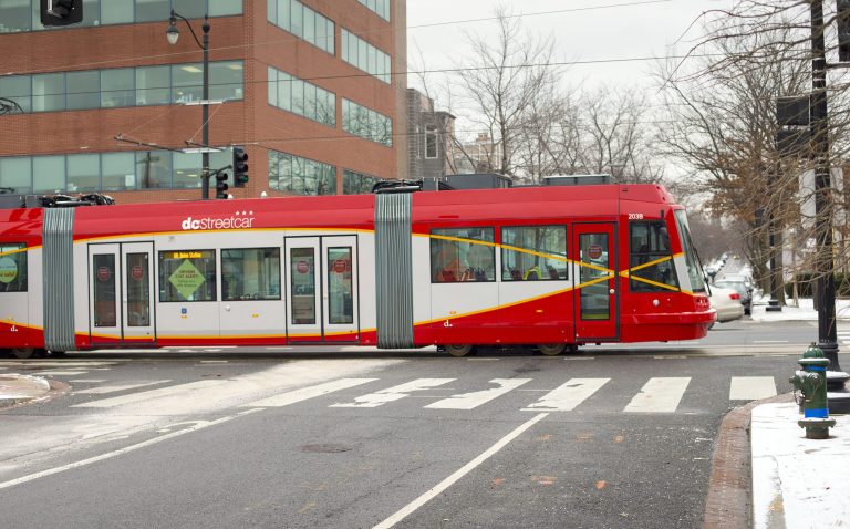The fact that trolley lines can't be easily or inexpensively moved, as bus lines can, means that entrepreneurs will build bars and restaurants on trolley-served streets, which D.C.'s H Street N.E. will be if the proposed trolley line is up and operating. (AP Photo)