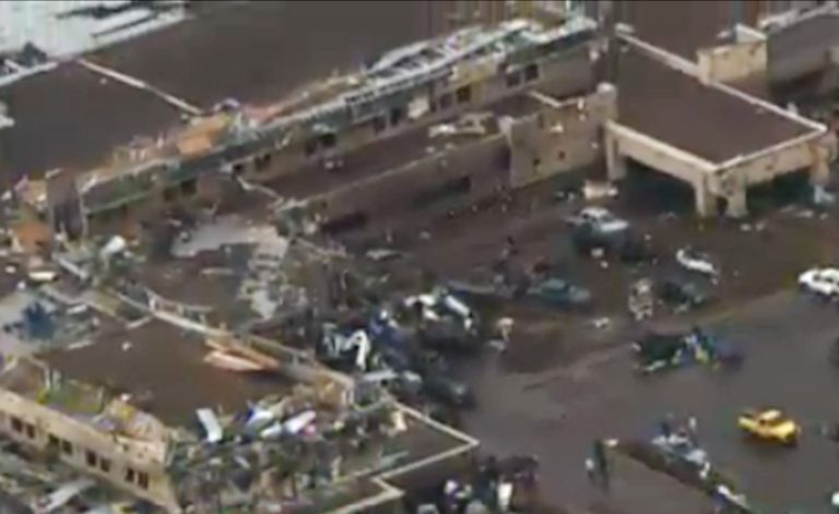 This frame grab courtesy of KFOR TV shows the aftermath of a massive tornado as much as a mile wide with winds up to 200 mph roared through the Oklahoma City suburbs Monday, May 20, 2013. (AP Photo/Courtesy KFOR TV)
