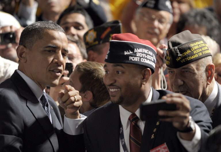 President Barack Obama greets the crowd after speaking at the 113th National Convention of the VFW in Reno, Nev., Monday, July 23, 2012. (AP Photo/Susan Walsh)