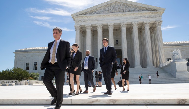 The Constitution accords very different protections to U.S. persons -- including green card holders -- than to individuals with no legal status in the U.S. (AP Photo/J. Scott Applewhite)