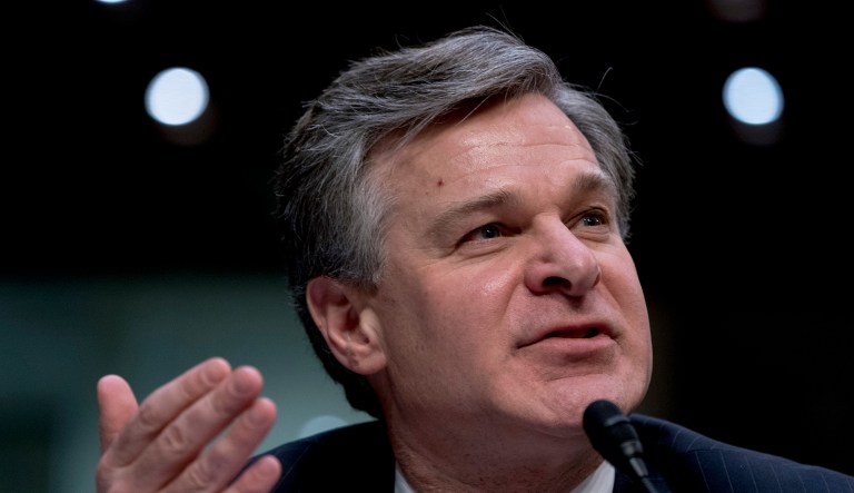 FBI Director Christopher Wray (pictured above) seemed to contradict the White House's claim about an ongoing investigation in Senate testimony on Tuesday, when he revealed Rob Porter's file had been closed by his department in January, though additional information had been passed along to the White House earlier this month. (AP Photo/Andrew Harnik)