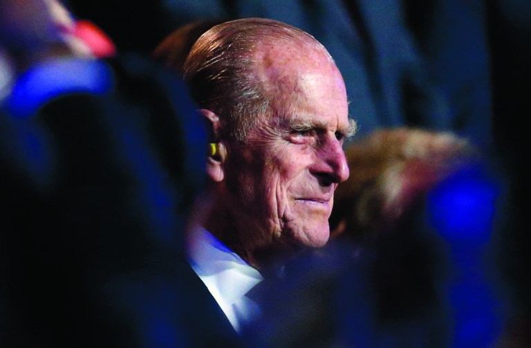 FILE - In this July 27, 2012 file photo, Britain's Prince Philip, the Duke of Edinburgh attends the Opening Ceremony at the 2012 Summer Olympics. Buckingham Palace said Wednesday, Aug. 15, 2012 that the queen's husband, Prince Philip, has been taken to a Scottish hospital as "a precautionary measure." (AP Photo/Jae C. Hong, File)