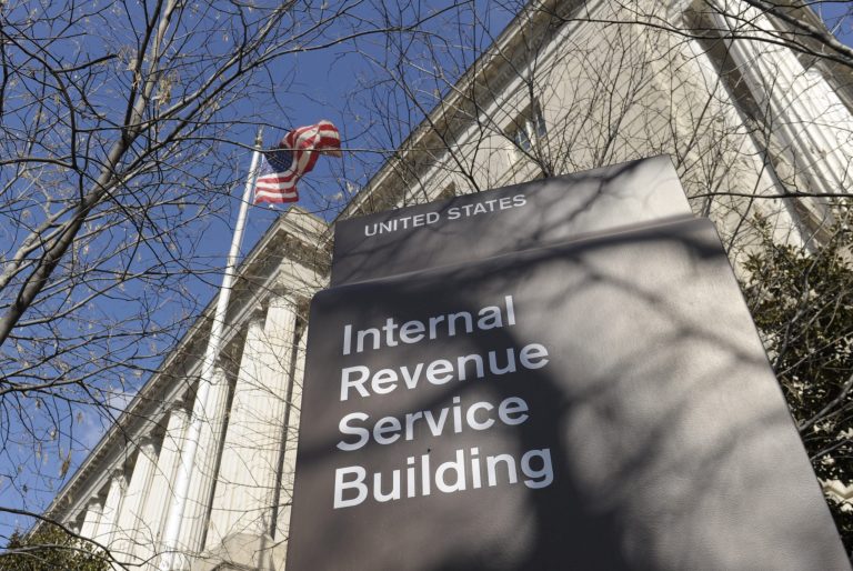 The IRS collects most of its money through voluntary compliance with tax laws. But if a tax bill is unpaid, it can be turned over to the Automated Collection System. (AP Photo)