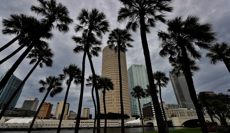 Storm clouds associated with the outer bands of Hurricane Irma shroud the downtown skyline Saturday, Sept. 9, 2017, in Tampa, Fla. Several parts of the Tampa Bay area are under a mandatory evacutation order for the approaching storm. (AP Photo/Chris O'Meara)