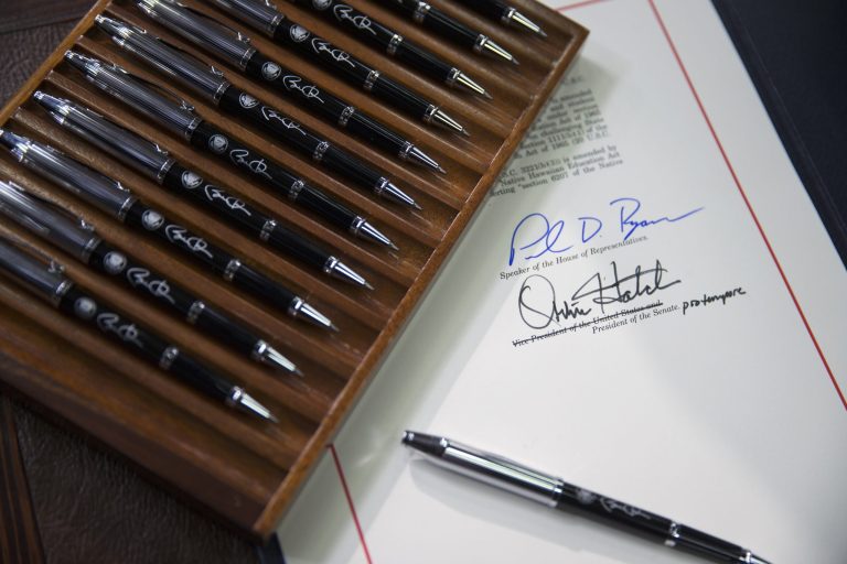 For every law approved last year, President Obama's administration issued 30 new regulations. (AP Photo/Evan Vucci)