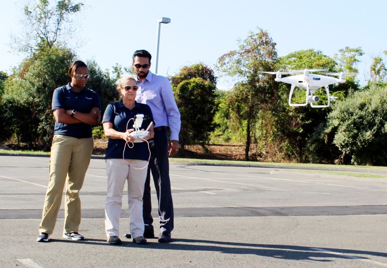 Laura Shell, center, a Travelers catastrophe claims specialist from Lexington, Va., trains to become a certified drone operator at the insurance company's Windsor, Conn., training center on Aug. 30. The industry is using drones to help assess damage in Texas from Hurricane Harvey. (AP Photo/Pat Eaton-Robb)