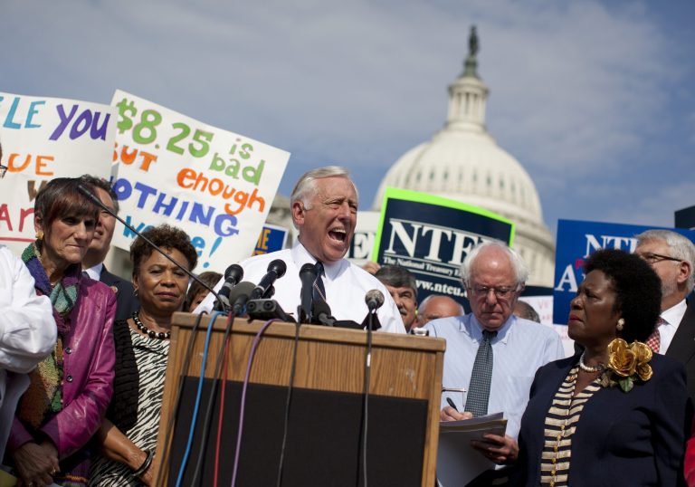 In this Oct. 4, 2013, photo, House Minority Whip Steny Hoyer of Md., center, speaks on Capitol Hill in Washington, during an event with the Democratic Progressive Caucus and furloughed federal employees blaming House Republicans on the government shutdown. From left are, Rep. Rosa DeLauro, D-Conn., Rep. Barbara Lee, D-Calif., Hoyer, Rep. Bernard Sanders and Rep. Sheila Jackson Lee, D-Texas. Republicans and Democrats have wasted little time trying to use the first federal government shutdown in a generation for political advantage ahead of next year's midterm elections, seizing on the plight of furloughed workers and shuttered government services to cast blame on each other.  (AP Photo/ Evan Vucci)