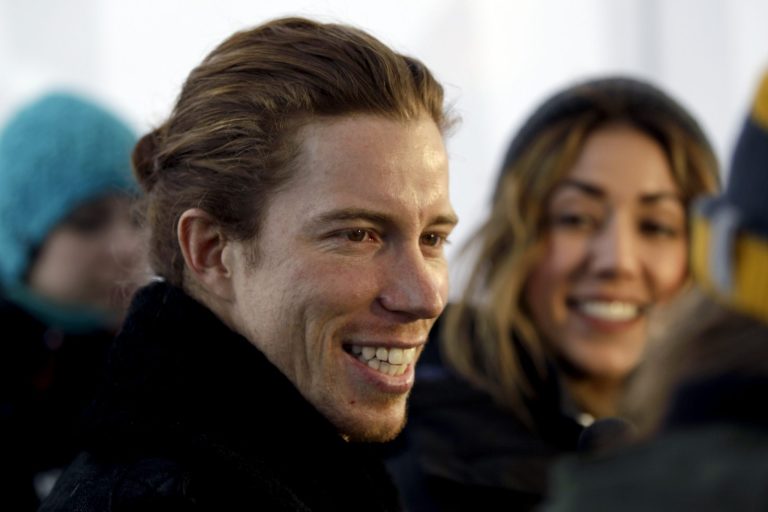 FILE - In this Dec. 14, 2012, file photo, Shaun White smiles during a television interview in Breckenridge, Colo. White on Wednesday, Feb. 5, 2014 said that he is pulling out of the Olympic slopestyle contest to focus solely on winning a third straight gold medal on the halfpipe. (AP Photo/Brennan Linsley, File)