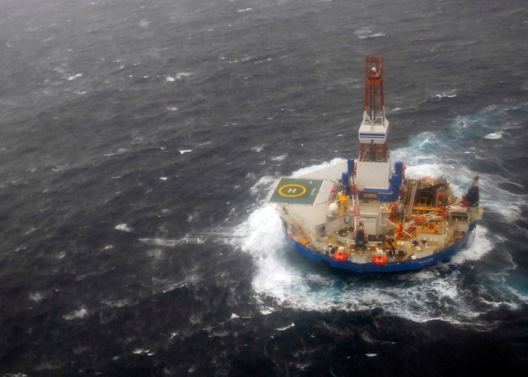 The mobile drilling unit Kulluk is towed by tugs in high winds and high seas some 116 miles southwest of Kodiak City, Alaska, in December 2012. (AP Photo/U.S Coast Guard, Chris Usher)