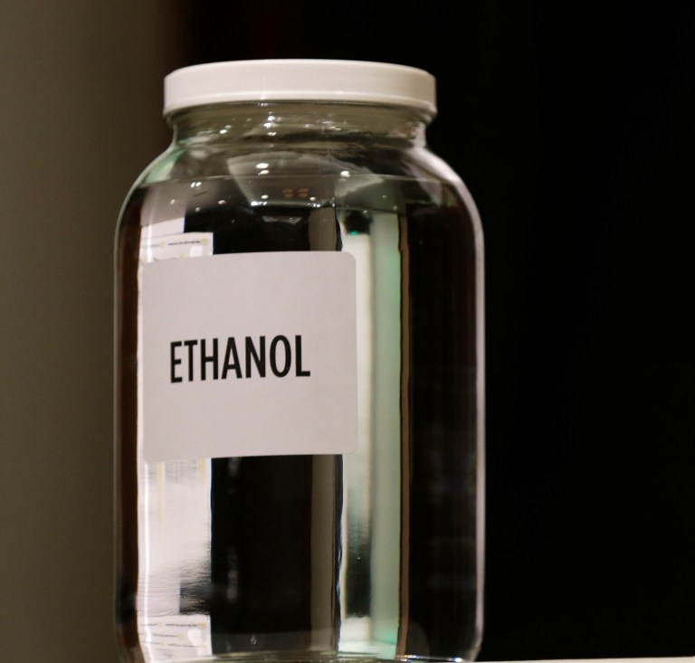 A jar of ethanol fuel sits on display during the Iowa Renewable Fuels Association meeting. (AP Photo/Charlie Neibergall)