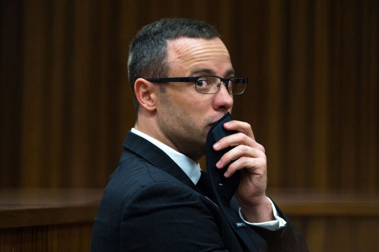 Oscar Pistorius, gestures, as he listens to psychiatric evidence for his defense, during his ongoing murder trial in Pretoria, South Africa, Tuesday, May 13, 2014. The chief prosecutor in the murder trial of Oscar Pistorius has asked that the double-amputee runner be placed under psychiatric evaluation after an expert witness testified that he had an anxiety disorder.  Pistorius is charged with the shooting death of his girlfriend Reeva Steenkamp on Valentine's Day in 2013. (AP Photo/Daniel Born, Pool)