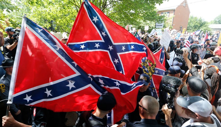 The father of a North Dakota man who marched in a white-nationalist rally in Charlottesville, Va., this weekend has denounced his son's behavior, saying that "he is not welcome at our family gatherings any longer."