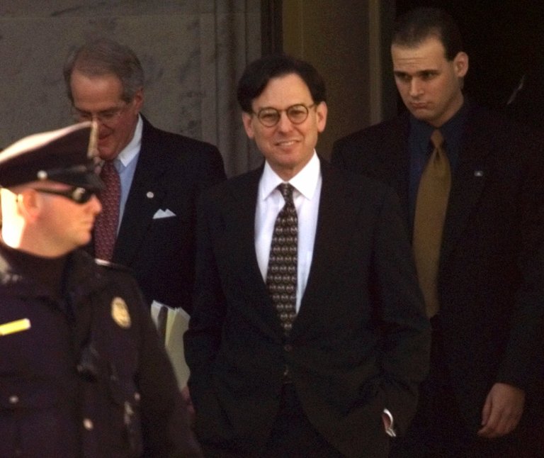 Presidential advisor Sidney Blumenthal, center, departs Capitol Hill after being deposed by House prosecutors Wednesday, Feb. 3, 1999, in Washington. Blumenthal is the third witness to be questioned by House prosecutors in the impeachment trial of President Clinton. (AP Photo/Khue Bui)