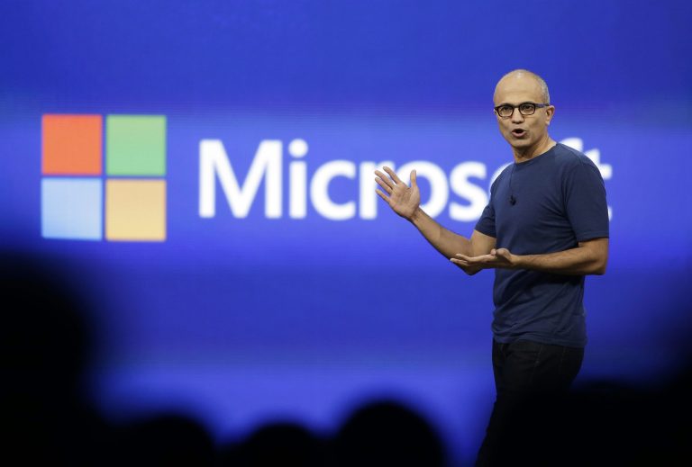 In this April 2, 2014, photo, Microsoft CEO Satya Nadella gestures during the keynote address of the Build Conference in San Francisco. 