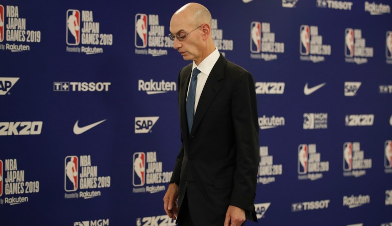NBA Commissioner Adam Silver walks away from the podium after speaking at a news conference before an NBA preseason basketball game between the Houston Rockets and the Toronto Raptors Tuesday, Oct. 8, 2019, in Saitama, near Tokyo.