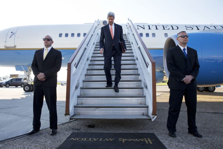 U.S. Secretary of State John Kerry arrives at Stansted Airport outside of London, where he is expected to attend meetings on Syria with the London 11, Wednesday, May 14, 2014. (AP Photo/Jacquelyn Martin, Pool)