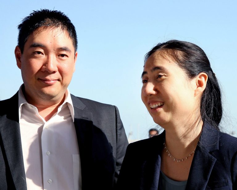American couple Grace and Matthew Huang arrive at the Hamad International Airport in Doha, Qatar, Sunday, Nov. 30, 2014. (AP Photo/Osama Faisal)