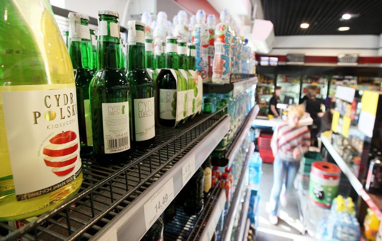 Bottles of Polish cider sit on a shelf in a small store in Warsaw, Poland, on Friday, Aug. 22, 2014. A Russian ban on European food imports has sparked a debate in Poland over whether to allow advertising cider. The country is a major global apple exporter and had previously sent half its output to Russia. With officials scrambling to help apple producers, the Economy Ministry says it wants to lift a ban on advertising any alcohol other than beer. That has put it at odds with health advocates and the Health Ministry, which oppose encouraging greater alcohol consumption in a country where some people already drink too much. (AP Photo/Czarek Sokolowski)
