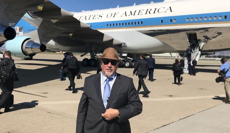 Conservative radio icon Michael Savage, shown beside Air Force One, has been chosen by President Trump to join the Presidio Trust.