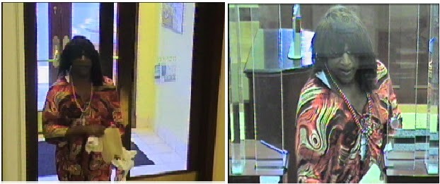Surveillance photo of a man dressed as a woman who robbed a Prince George's County bank.