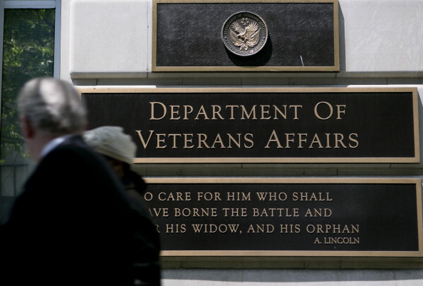 Pedestrians walk past the U.S. Department of Veterans Affairs (VA) headquarters in Washington, D.C., U.S., on Friday, May 10, 2013. (Andrew Harrer/Bloomberg via Getty images)