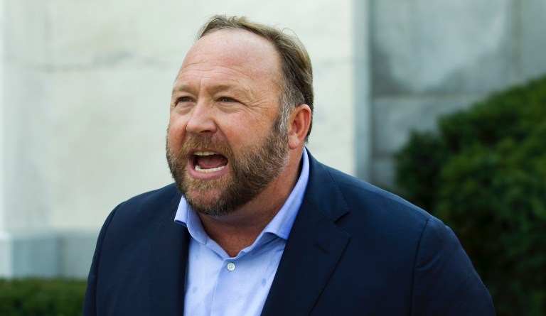 Alex Jones, the right-wing conspiracy theorist, walks the corridors of Capitol Hill, talking to reporters, after listening to Facebook COO Sheryl Sandberg and Twitter CEO Jack Dorsey testify before the Senate Intelligence Committee on 'Foreign Influence Operations and Their Use of Social Media Platforms' on Capitol Hill, Wednesday, Sept. 5, 2018, in Washington.