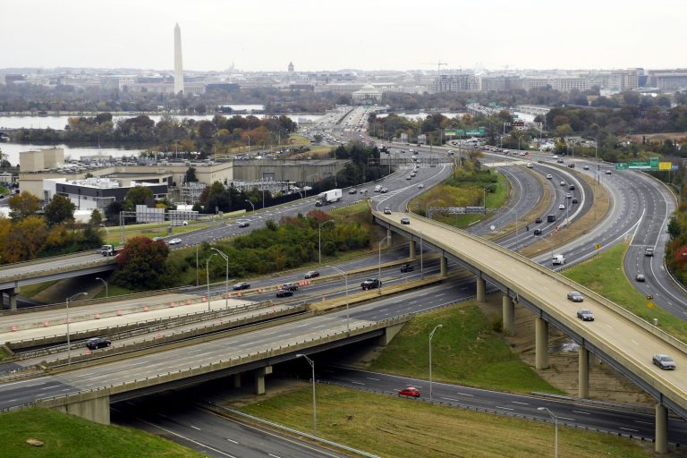FILE- This Friday, Nov. 9, 2018, file photo, shows a view of Washington from a revolving restaurant in Crystal City, Va. On Tuesday, Nov. 13, Amazon said it will split its second headquarters between Long Island City in New York and Crystal City. Development along major highways in Northern Virginia and Washington have led to âunreasonable traffic delays on a daily basisâ in the past few years, with drive times that used to take 40 minutes ballooning to up to 90 minutes, said Thomas Cooke, professor of business law at Georgetown University's McDonough School of Business. (AP Photo/Susan Walsh, File)