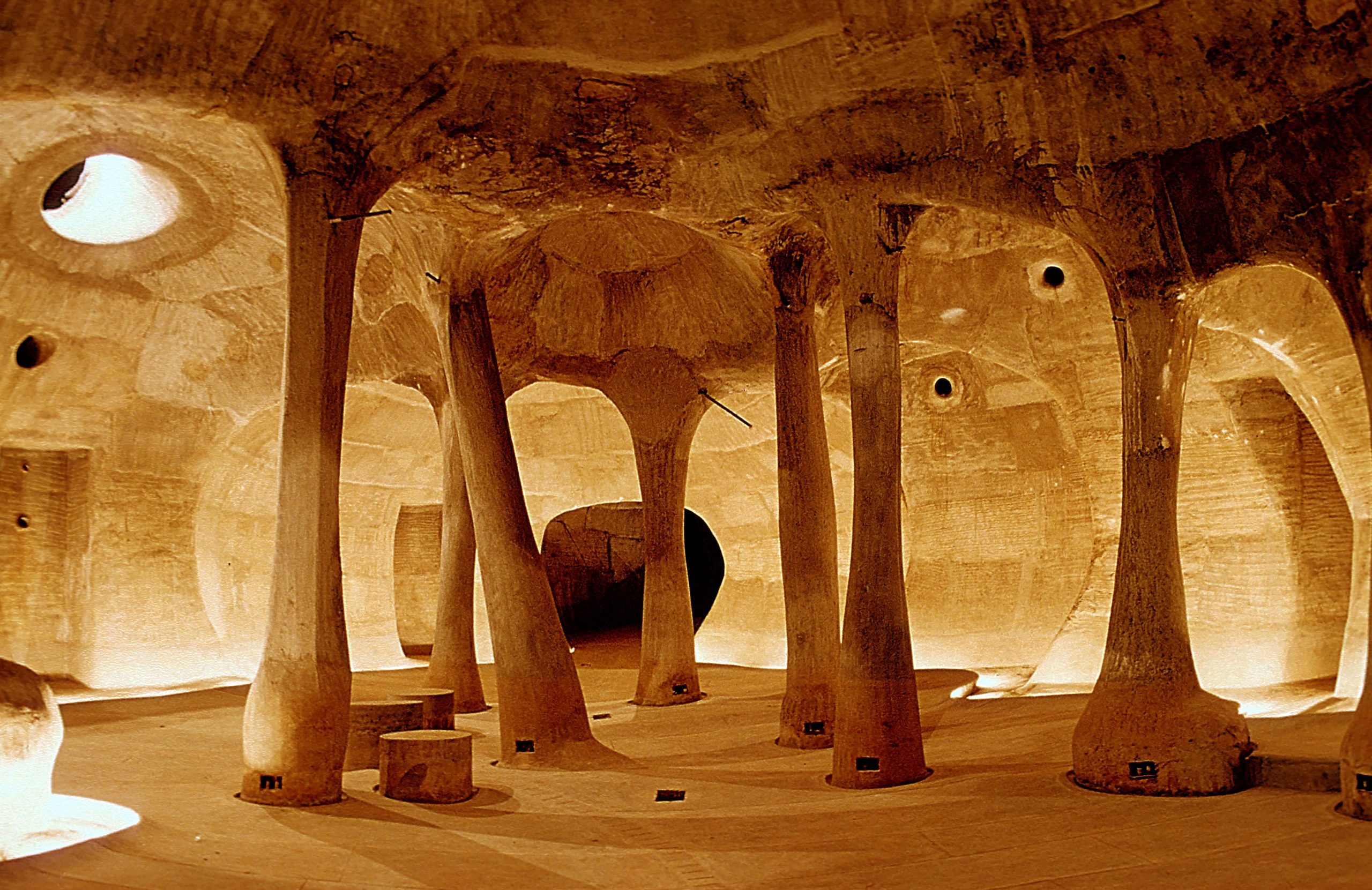 The inside of Amdavad ni Gufa (1994), Doshi’s cave-like art gallery in Ahmedabad, has undulating ferro-cement walls and pillars that look as if they were naturally formed.