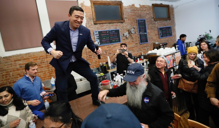 Democratic presidential candidate entrepreneur Andrew Yang reacts to audience members during a town hall at the Perry Perk coffee shop, Friday, Jan. 3, 2020, in Perry, Iowa. 