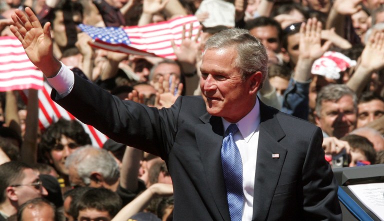 U.S. President George W. Bush waves to people in the crowd after speaking in Freedom Square Monday, May 10, 2005 in Tbilisi, Georgia. 