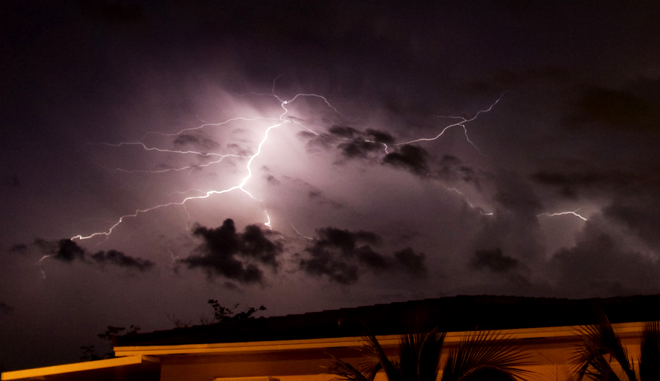 Man dies after he and wife are struck by lightning during family vacation in Florida