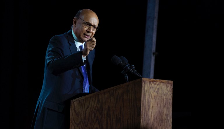 Khizr Khan, the father of fallen Army Capt. Humayun Khan, speaks outside the Jacob Javits Center during a rally for Democratic presidential candidate Hillary Clinton in New York Tuesday, Nov. 8, 2016.
