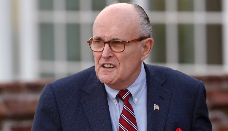 Former New York Mayor Rudy Giuliani arrives at the Trump National Golf Club Bedminster clubhouse, Sunday, Nov. 20, 2016, in Bedminster, New Jersey. 